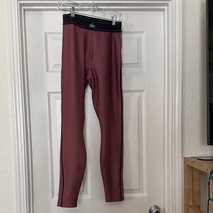 ALO Yoga Women’s  Air Lift Legging HR in the color Berry Truffle